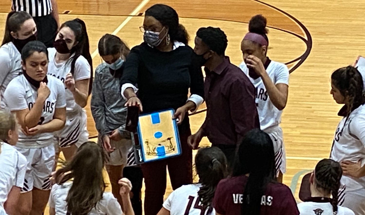 Tamara Collier, in her first year at the helm of Cinco Ranch, talks to her players during a timeout during a game against Morton Ranch on Jan. 6 at Cinco Ranch High.
